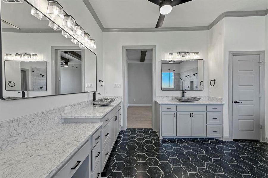 Bathroom with vanity, ceiling fan, and ornamental molding