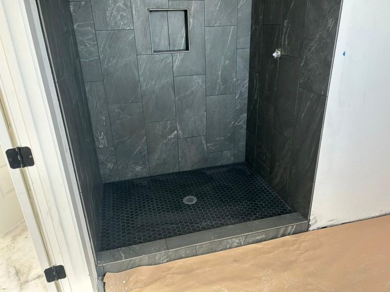 Bathroom with a stall shower