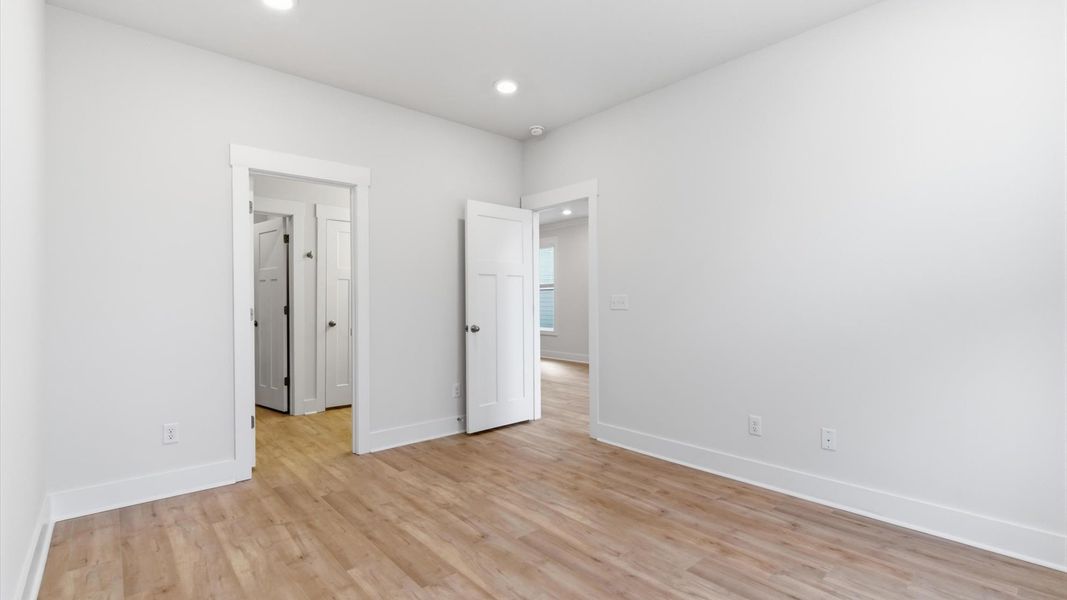 Primary suite that offers first-rate relaxation with established style and elevated finishes