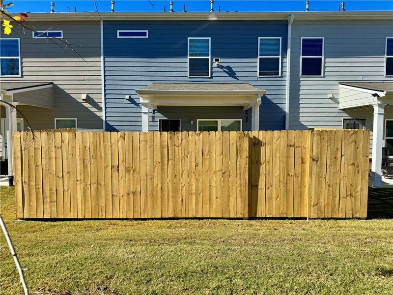 Exterior details and patio area of a home in Ellison Square, Sugar Hill (Image 26).