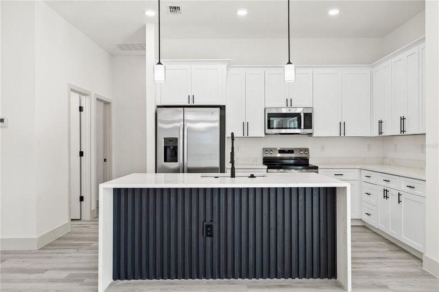 Furnished interior view inside a new home in , Port Charlotte (Image 9). Furnished interior view inside a new home in , Port Charlotte (Image 9).
