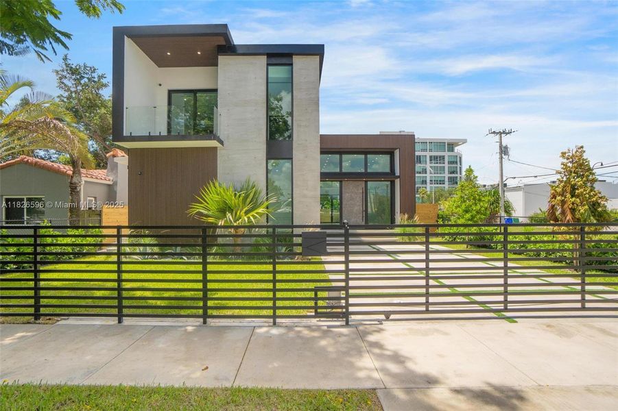 Front exterior of a new home in , Miami, FL, highlighting curb appeal (Image 29). Front exterior of a new home in , Miami, FL, highlighting curb appeal (Image 29).