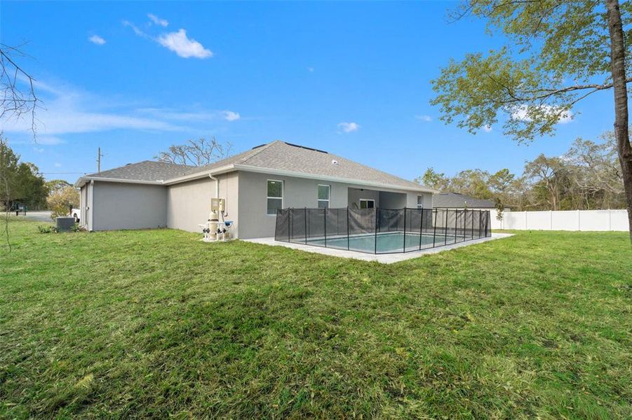 Exterior details and patio area of a home in , Spring Hill (Image 28).