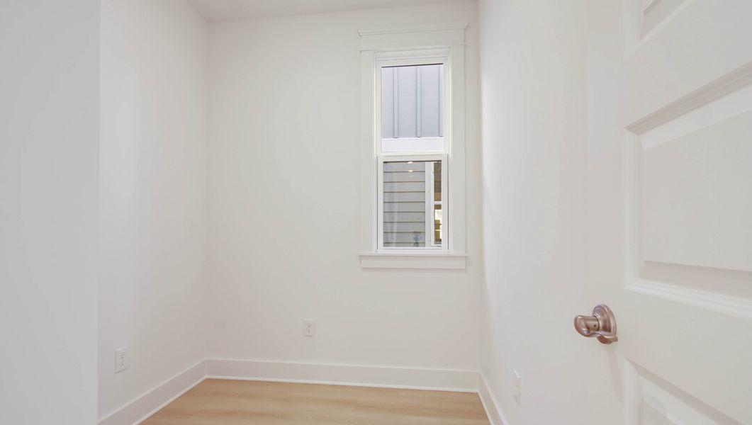 Representative unfurnished interior of a home built from the Ava by D.R. Horton in Parkside, Santa Rosa Beach (Image 21).