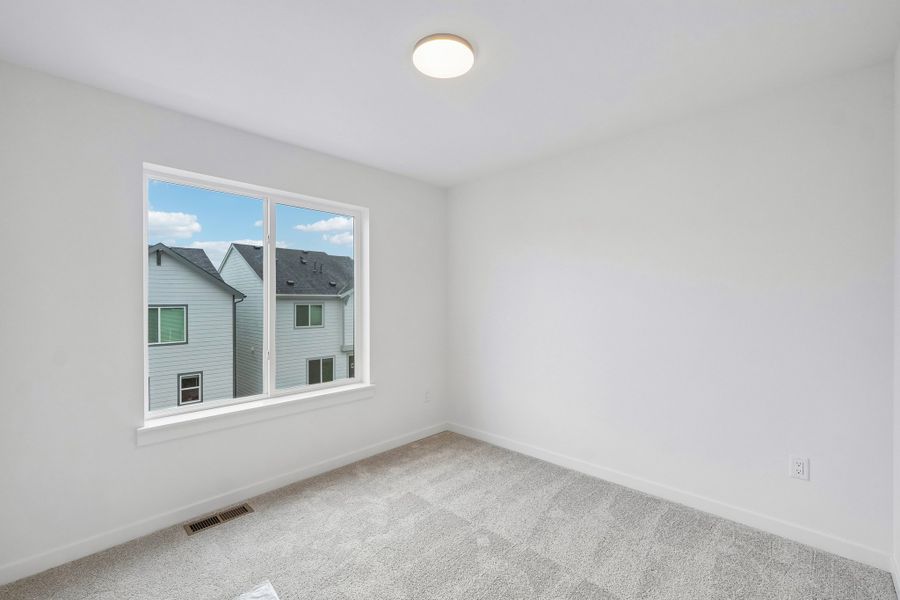 Spacious, unfurnished interior of a new home in Parkside at Victory Ridge, Colorado Springs (Image 30).