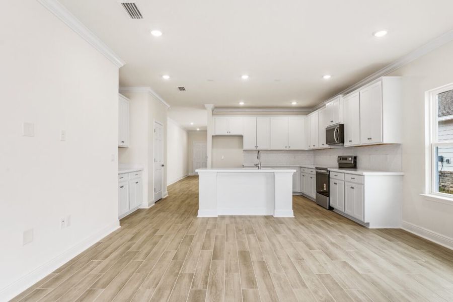 Furnished interior view inside a new home in Natureview, Freeport (Image 13).