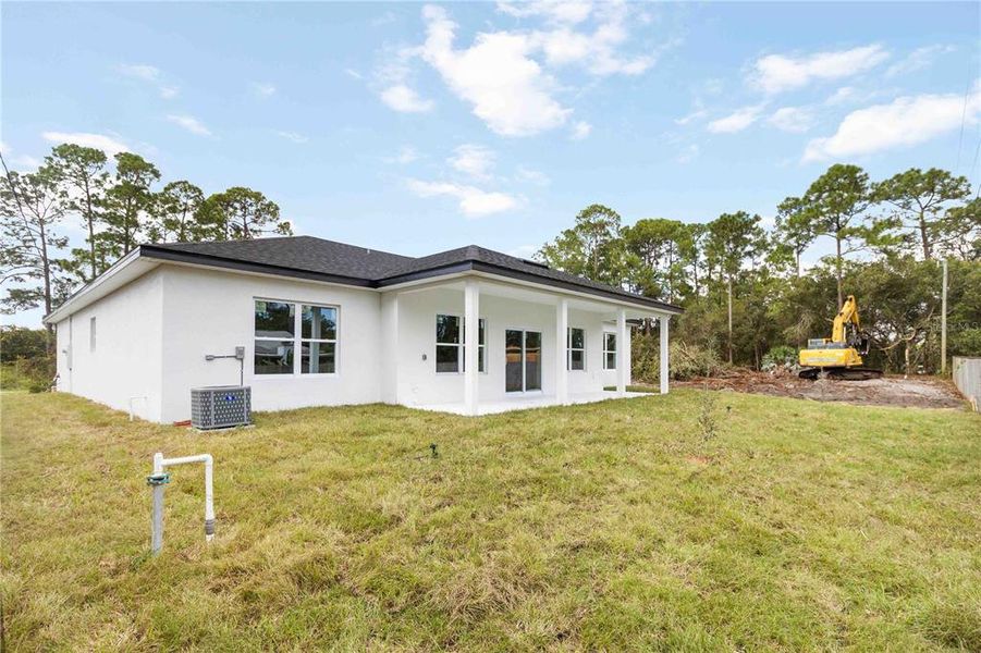 Exterior details and patio area of a home in , Palm Bay (Image 21). Exterior details and patio area of a home in , Palm Bay (Image 21).