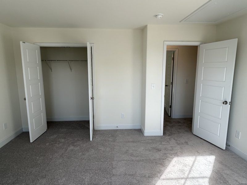 Spacious, unfurnished interior of a new home in Miller's Reserve, Winston-Salem (Image 51).