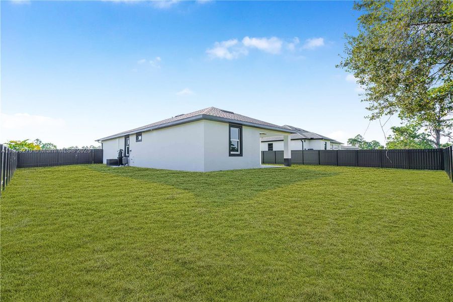 Exterior details and patio area of a home in , Lehigh Acres (Image 27). Exterior details and patio area of a home in , Lehigh Acres (Image 27).