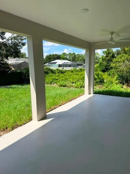 Exterior details and patio area of a home in , Lehigh Acres (Image 4).