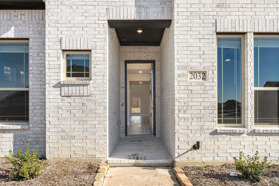 Exterior details and patio area of a home in Devonshire Classic 60-65, Forney (Image 3).