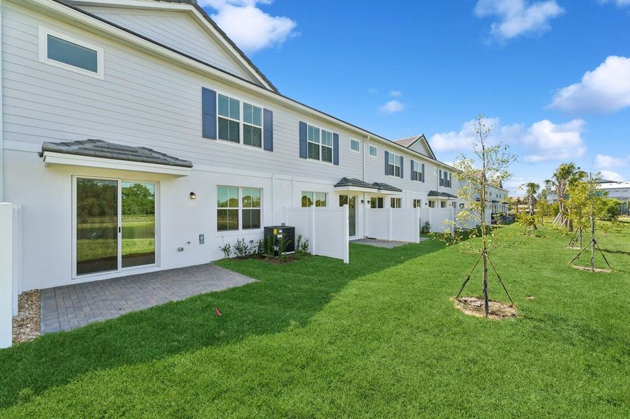 Exterior details and patio area of a home in Salerno Reserve Townhomes, Stuart (Image 3). Exterior details and patio area of a home in Salerno Reserve Townhomes, Stuart (Image 3).