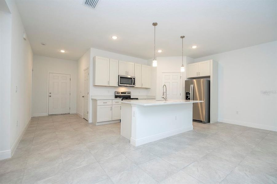 Furnished interior view inside a new home in , Dunnellon (Image 5).