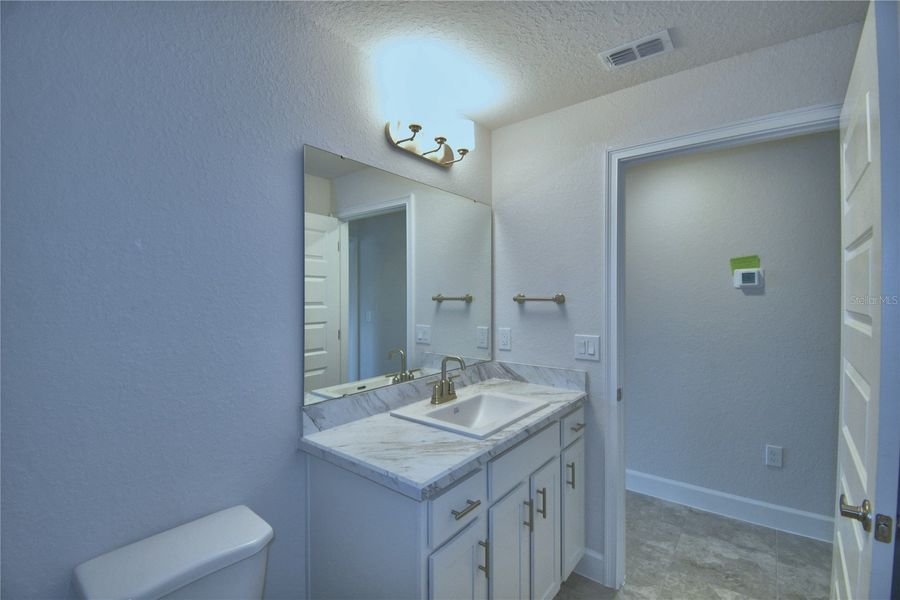 Furnished interior view inside a new home in Cadence Crossing, Auburndale (Image 9).