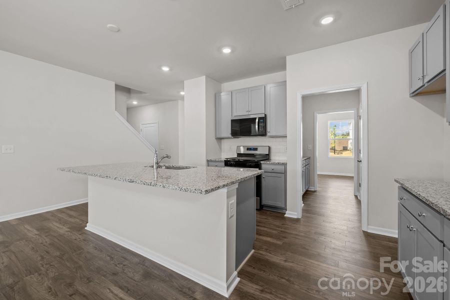 Furnished interior view inside a new home in McFarland Estates, York (Image 6).
