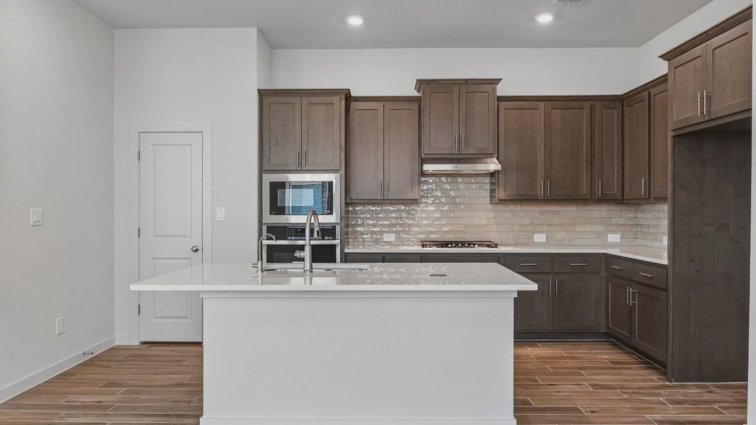 Furnished interior view inside a new home in Stream Waters, Seguin (Image 4).