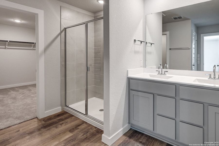 Furnished interior view inside a new home in Hacienda, San Antonio (Image 9).