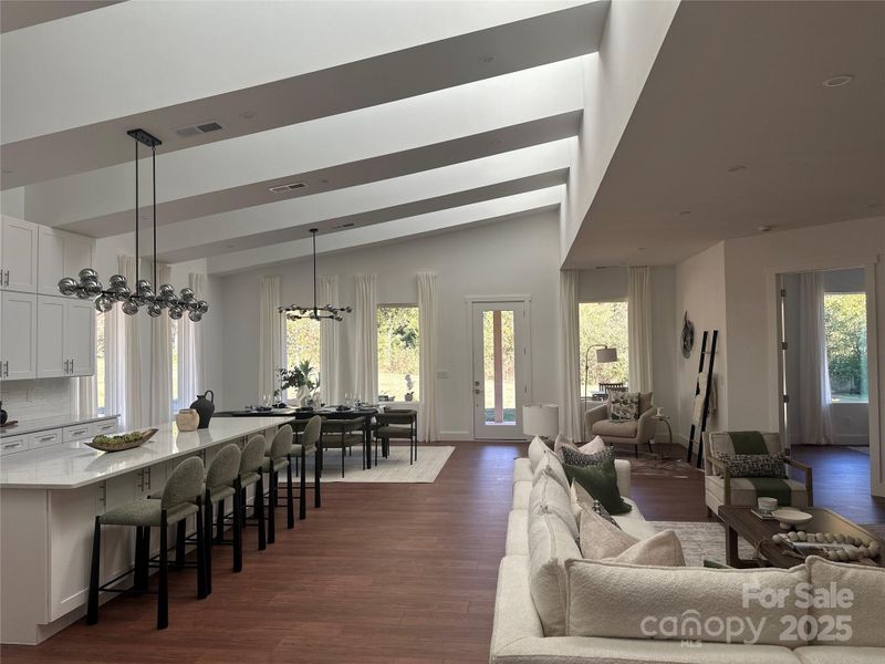 Great Room with no lights on. All natural light.