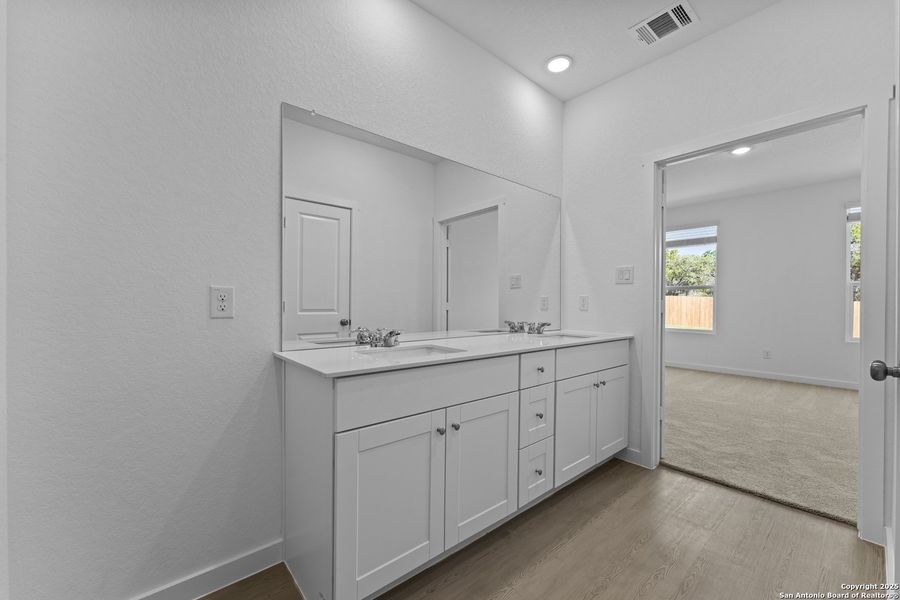 Furnished interior view inside a new home in Waterwheel: Coastline Collection, San Antonio (Image 5).