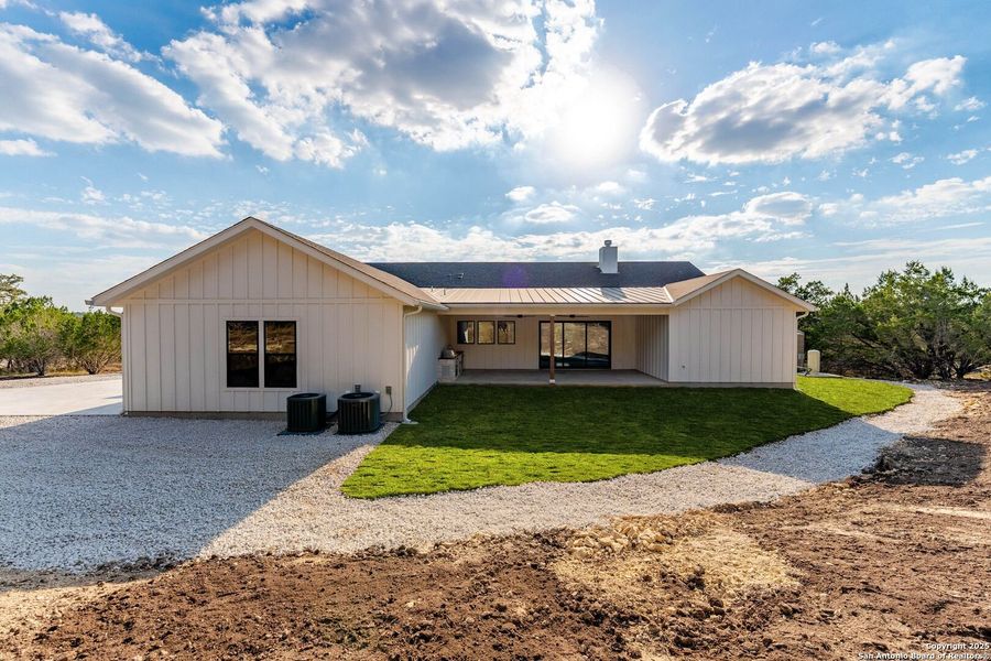 Front exterior of a new home in , Boerne, TX, highlighting curb appeal (Image 27).