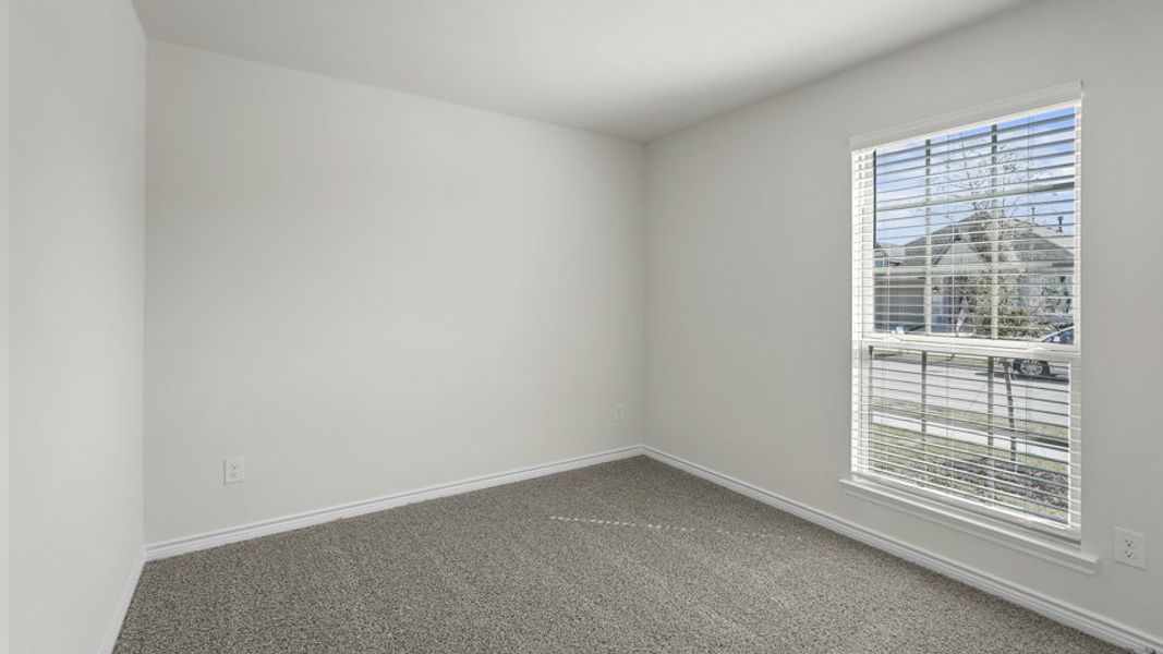 Representative unfurnished interior of a home built from the Wimberley by D.R. Horton in Woodcreek, Fate (Image 16). Representative unfurnished interior of a home built from the Wimberley by D.R. Horton in Woodcreek, Fate (Image 16).