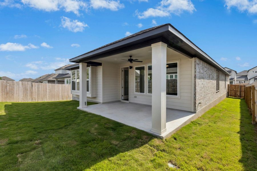 Exterior details and patio area of a home in University Heights, Round Rock (Image 17).
