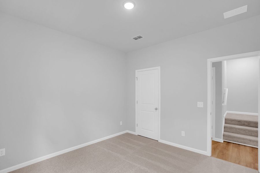 Spacious, unfurnished interior of a new home in Bradford Pointe, Summerville (Image 48).