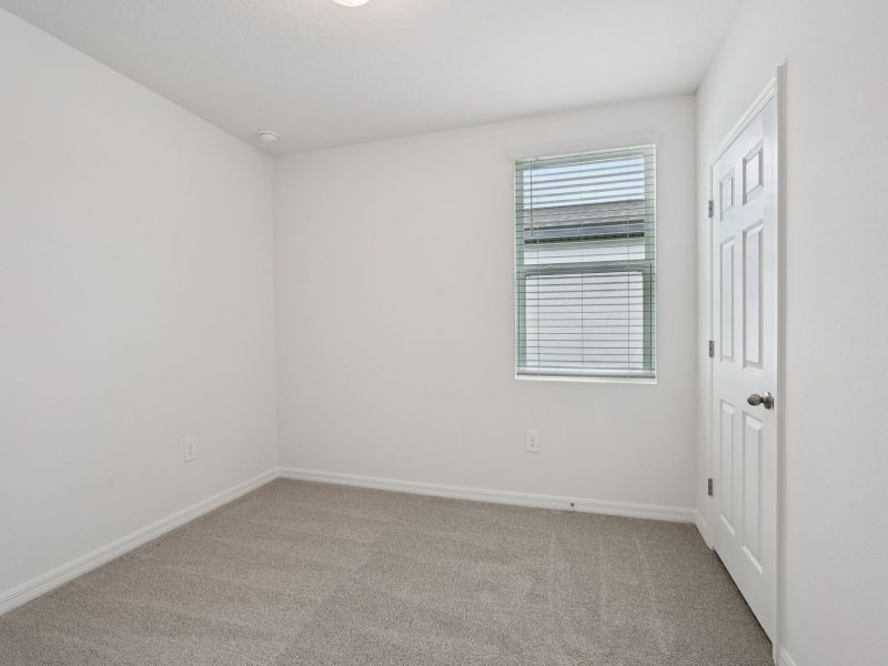 Spacious, unfurnished interior of a new home in Villamar - Classic Series, Winter Haven (Image 9).