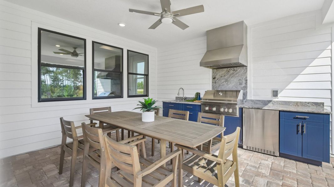 Outdoor Summer Kitchen and Sitting Area in the Marigold Floor Plan