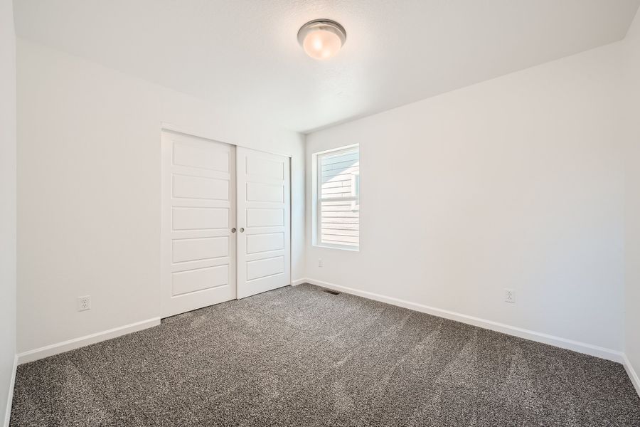 Spacious, unfurnished interior of a new home in The Aurora Highlands, Aurora (Image 27).