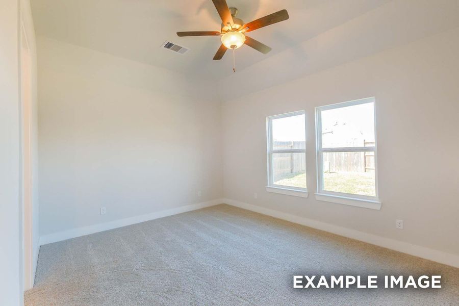 Spacious, unfurnished interior of a new home in Sunterra, Katy (Image 13).