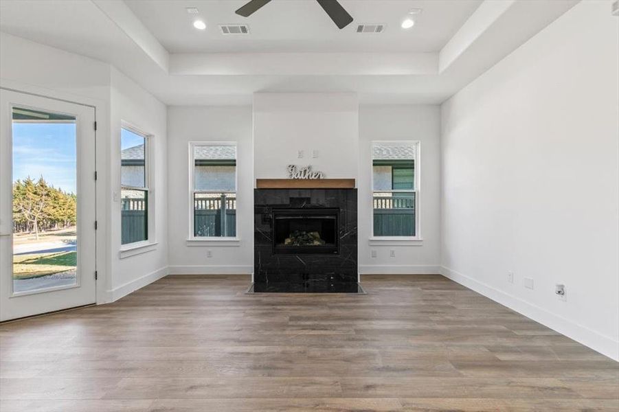 Elegant tile framed gas fireplace