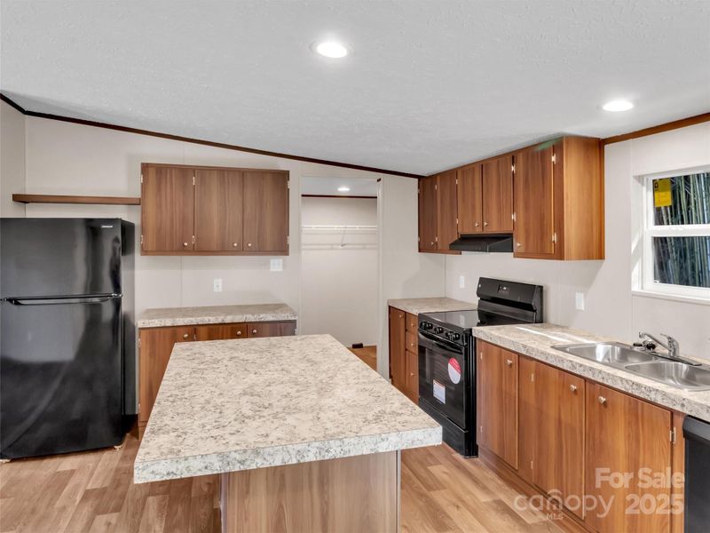 Furnished interior view inside a new home in , Waynesville (Image 6).