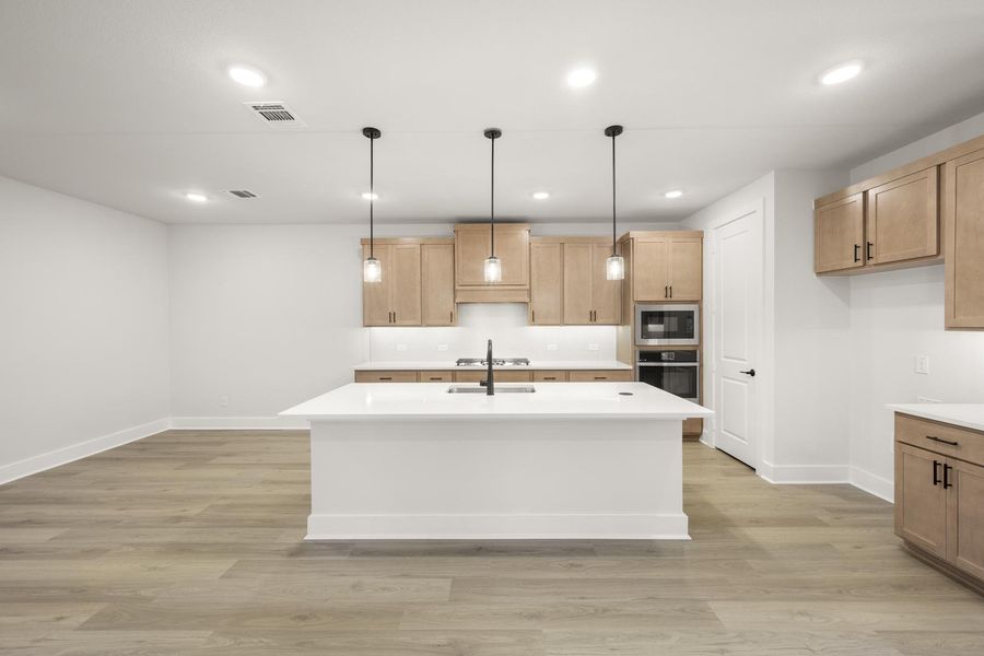 Furnished interior view inside a new home in Terrace Collection at Harvest, Argyle (Image 5).