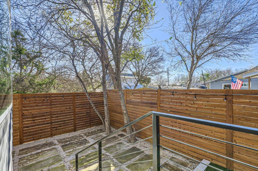 Private backyard space with plenty of room for outdoor dining, gardening, or relaxing under the open sky.