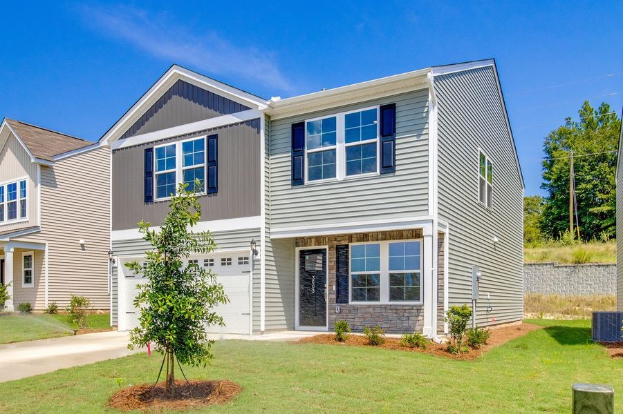 Front exterior of a new home in Bluefield, Lexington, SC, highlighting curb appeal (Image 26).
