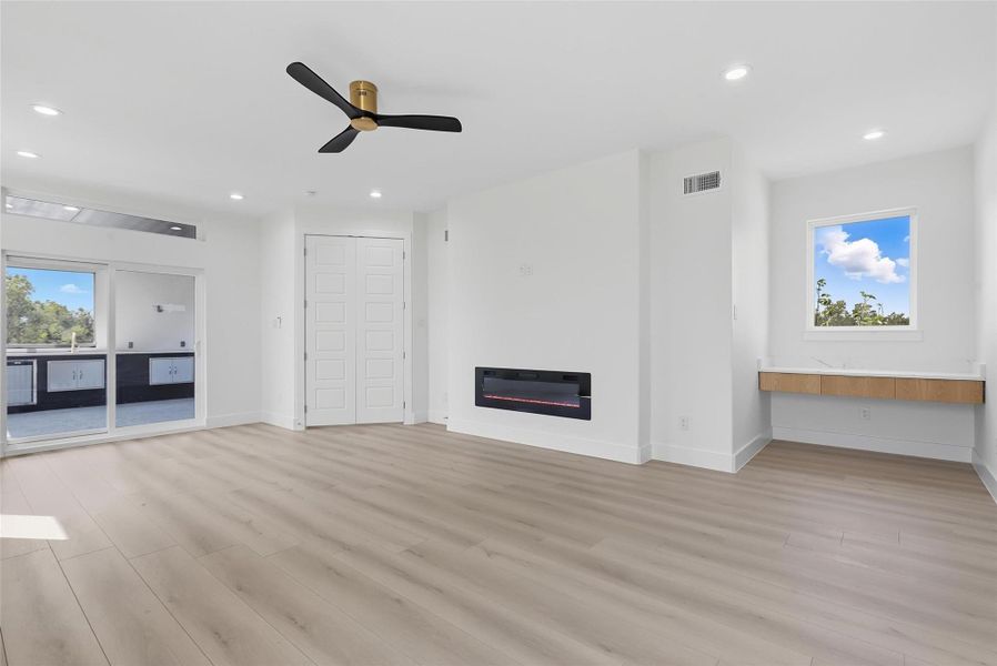 primary bedroom with fireplace