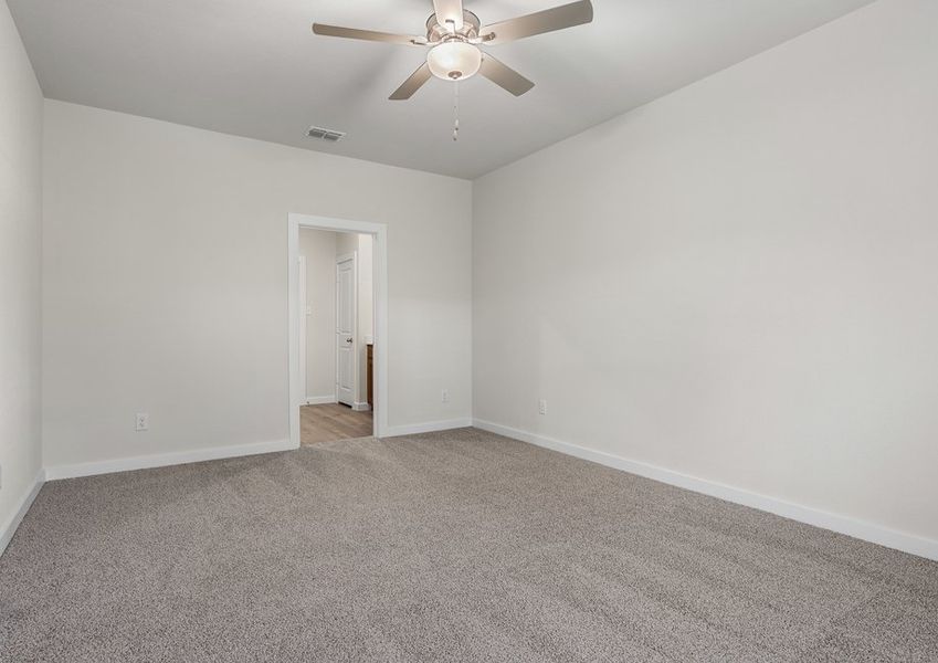 The master suite has a large bedroom, ensuite bathroom and a walk-in closet.