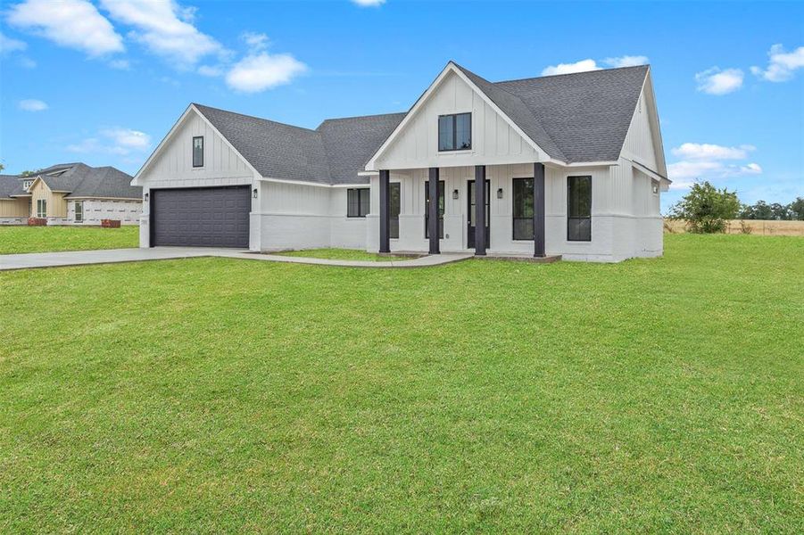 Front exterior of a new home in , Millsap, TX, highlighting curb appeal (Image 17).