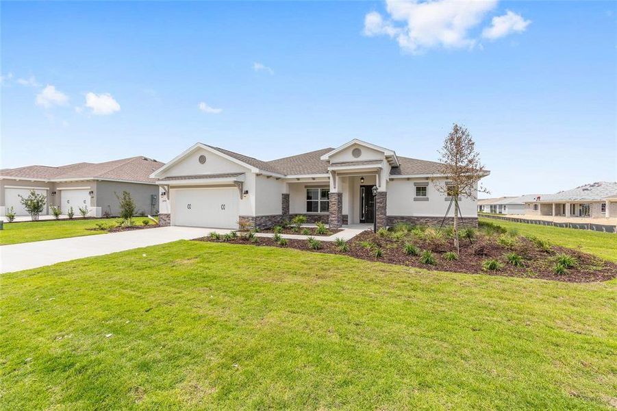 Front exterior of a new home in , Ocala, FL, highlighting curb appeal (Image 19). Front exterior of a new home in , Ocala, FL, highlighting curb appeal (Image 19).