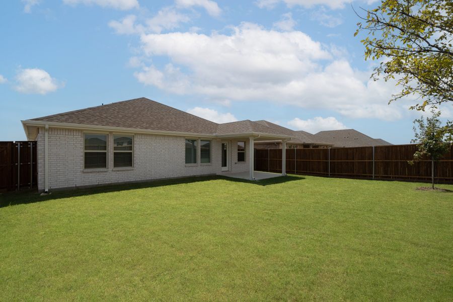 Exterior details and patio area of a home in Lake Pointe, Little Elm (Image 2).