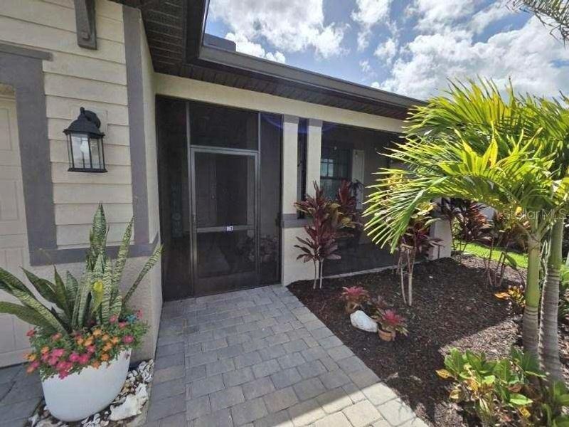 Exterior details and patio area of a home in , Estero (Image 28).