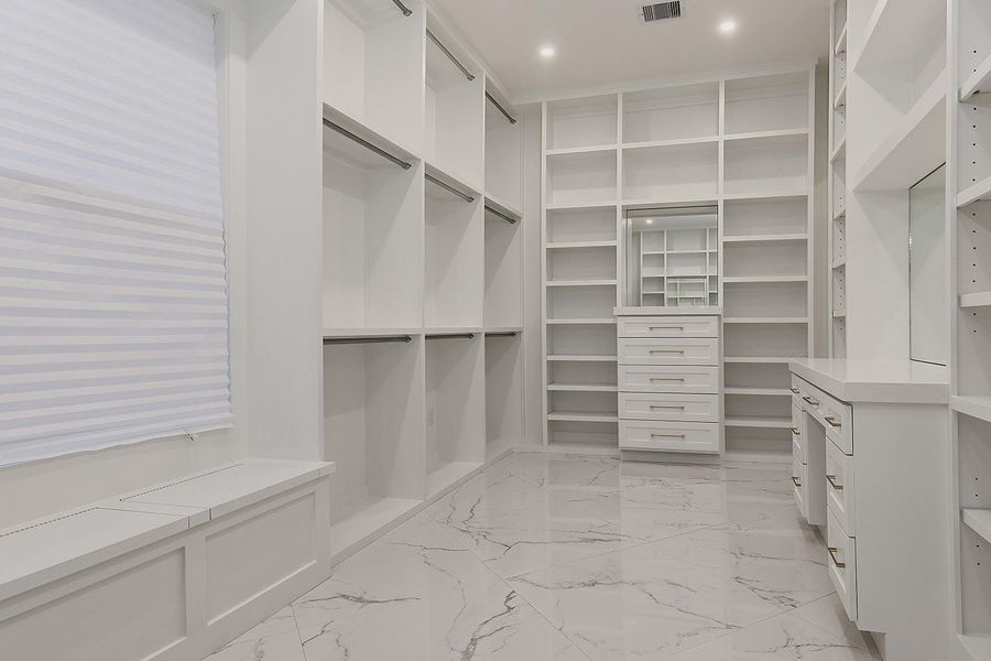 Custom Closet Shelving and Divided Hanging Spaces Custom Closet Shelving and Divided Hanging Spaces