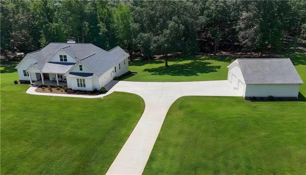 Front exterior of a new home in , Dawsonville, GA, highlighting curb appeal (Image 24).