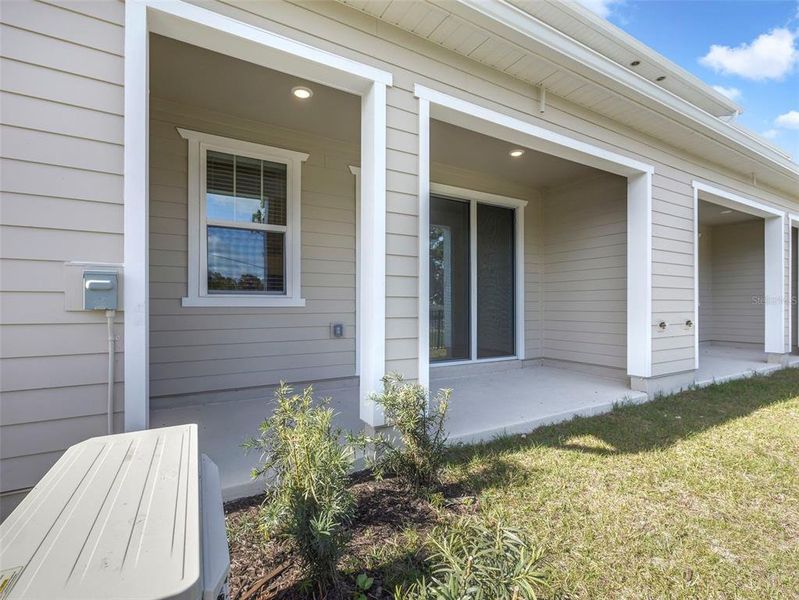 Exterior details and patio area of a home in Towns at Riverwalk, Sanford (Image 23). Exterior details and patio area of a home in Towns at Riverwalk, Sanford (Image 23).
