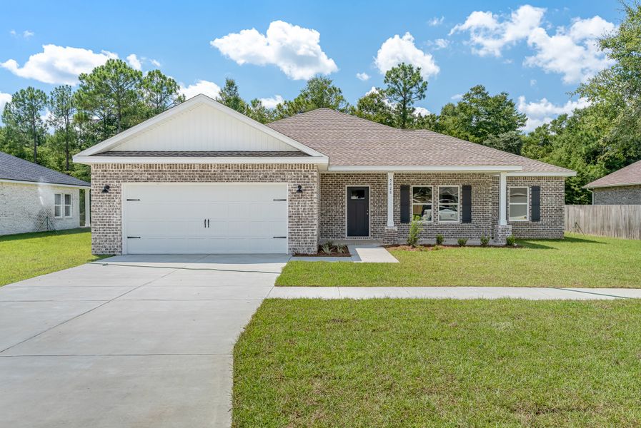 Front exterior of a new home in Barton's Bend, Crestview, FL, highlighting curb appeal (Image 1). Front exterior of a new home in Barton's Bend, Crestview, FL, highlighting curb appeal (Image 1).