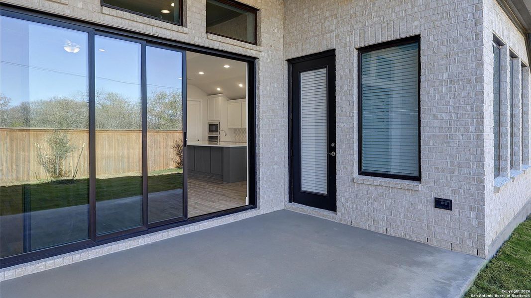 Exterior details and patio area of a home in Vida 50', San Antonio (Image 23).