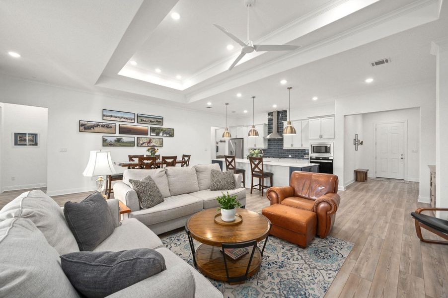 Stylish tray ceilings are complemented by sleek, modern fixtures for a refined finish Stylish tray ceilings are complemented by sleek, modern fixtures for a refined finish