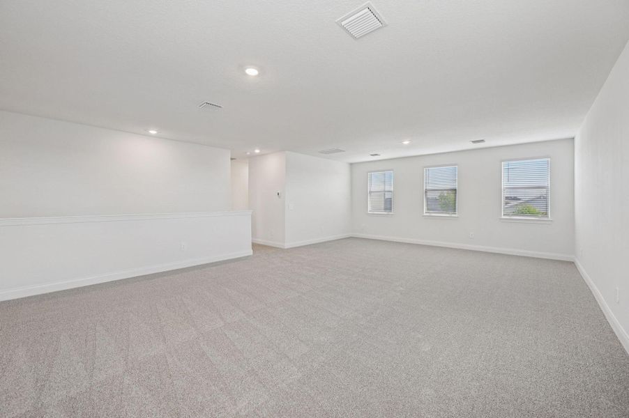 Spacious, unfurnished interior of a new home in Brystol at Wylder - Reserve Series, Port St. Lucie (Image 21).