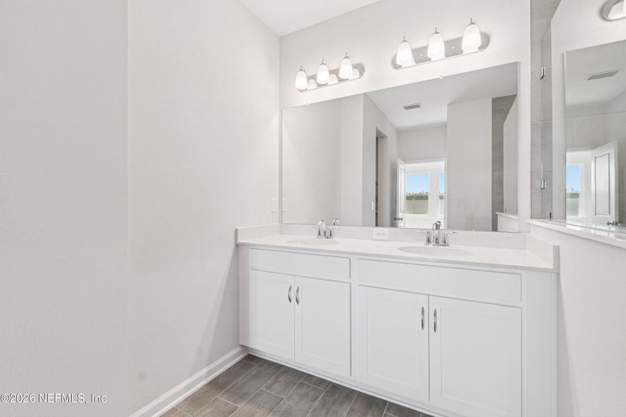 Furnished interior view inside a new home in Tributary 50', Yulee (Image 14).